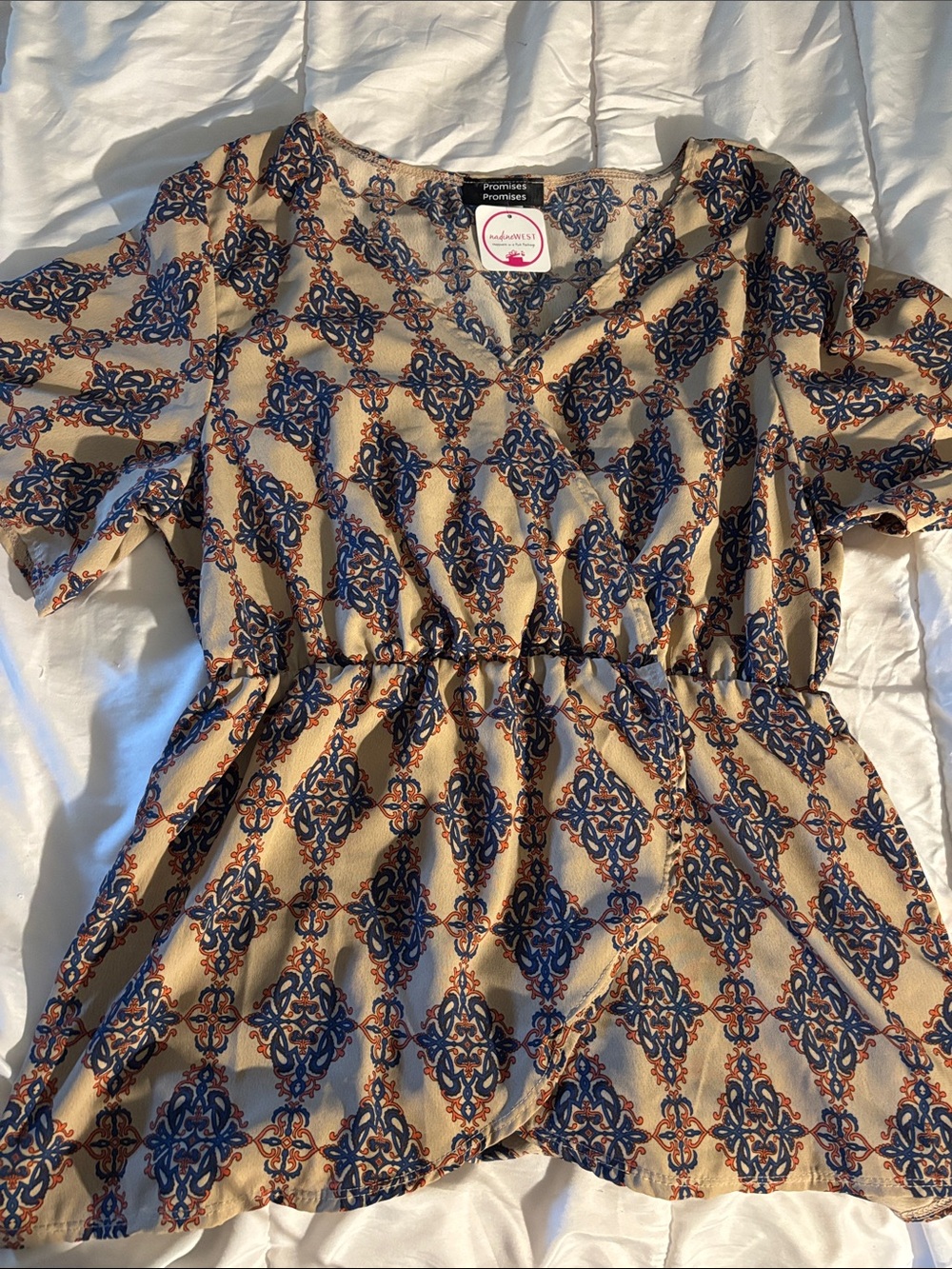 Printed Short Sleeve V-Neck Peplum Top in Beige and Navy